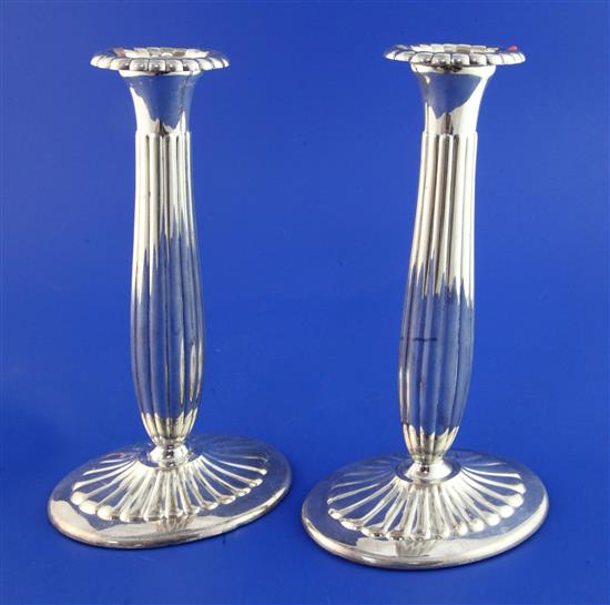 A pair of 20th century Norwegian 830 standard silver candlesticks, weighted.